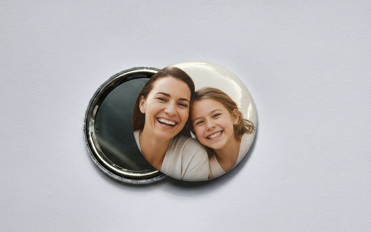 Photo shows back and front of pocket mirror